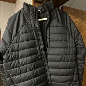 Brand new without tags Under Armour  women’s size M puffy black jacket